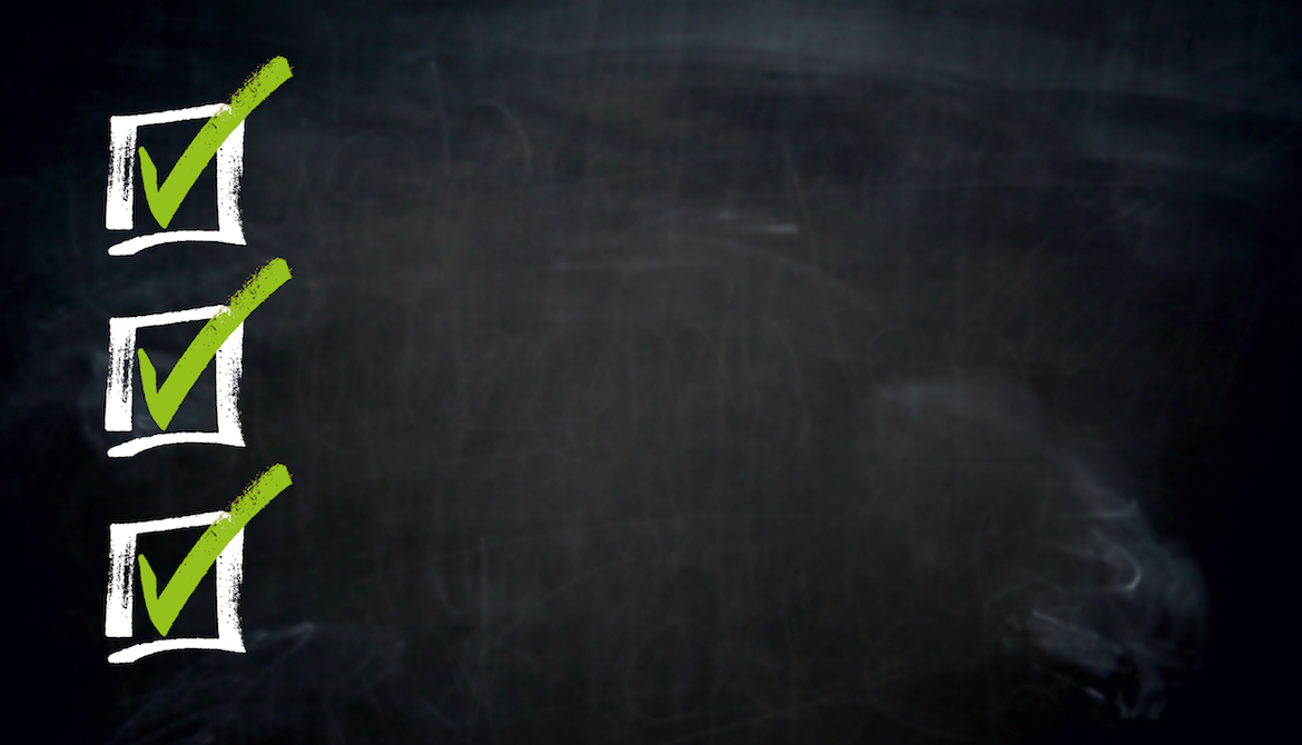 three boxes on a chalkboard with green checks in them signifying things to do for talent development