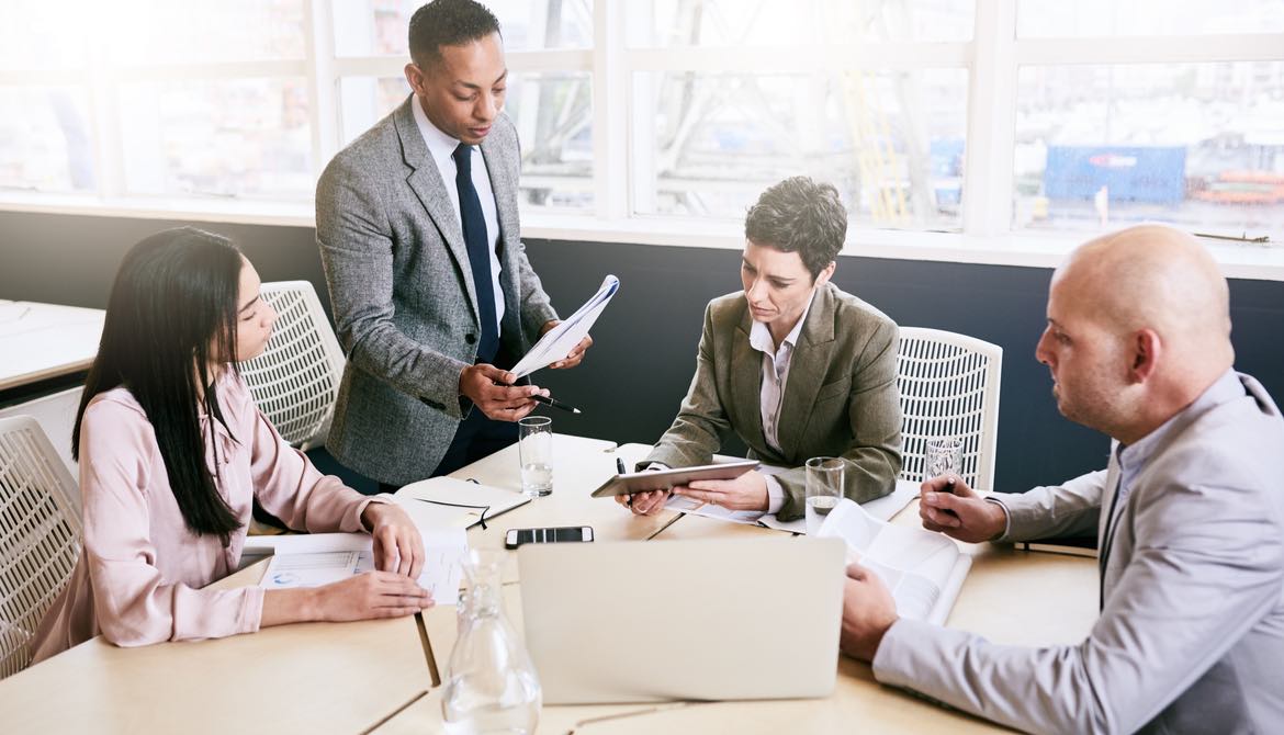 board members work together at a table