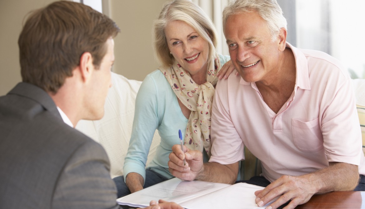 Financial representative assisting a couple