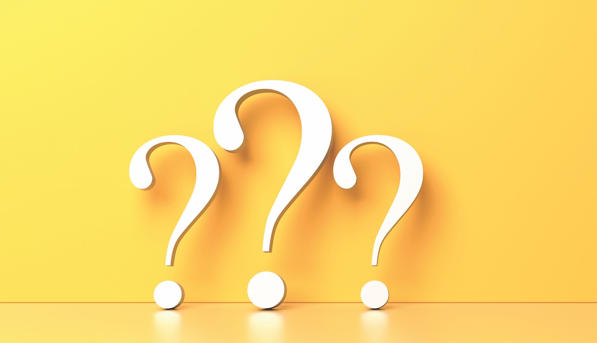 Three yellow question marks on a yellow background 