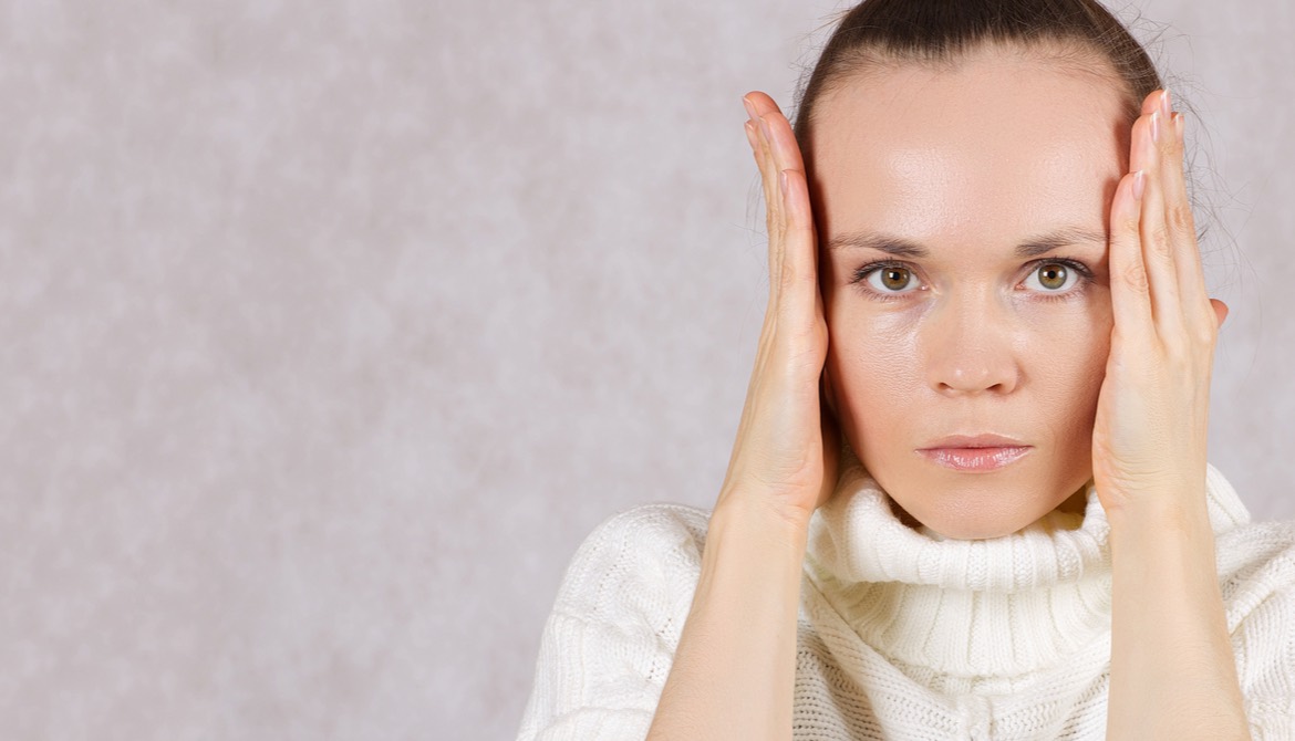 woman using hands as blinders