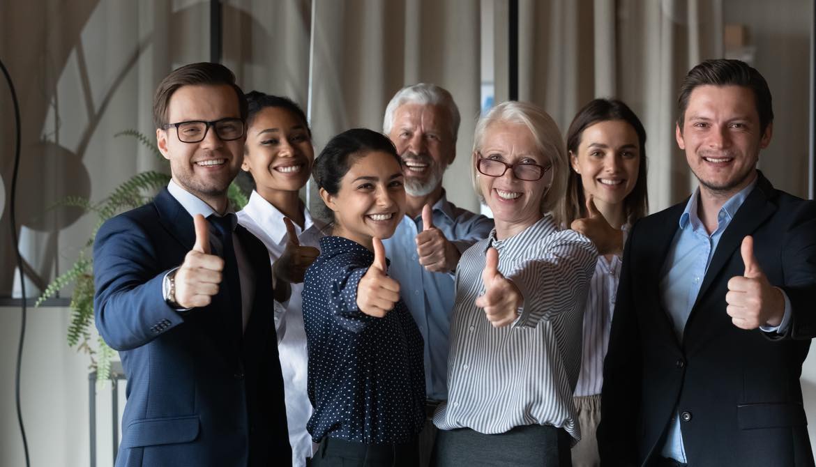 diverse team thumbs up