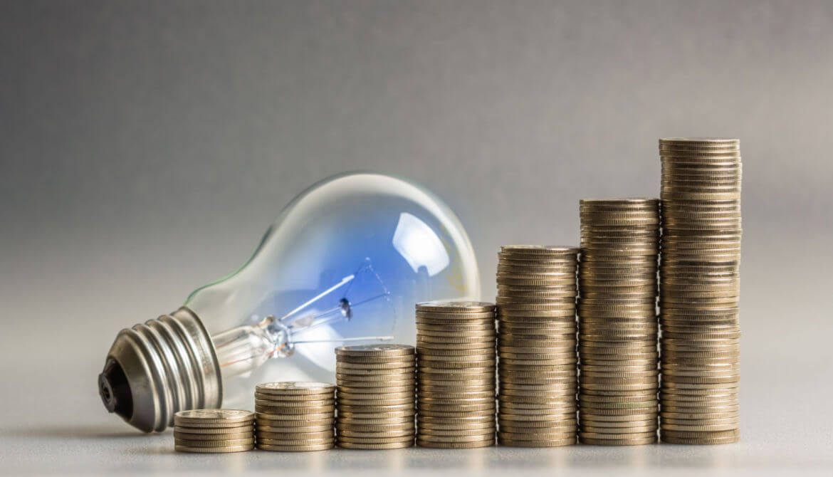 graph of stacks of coins with light bulb