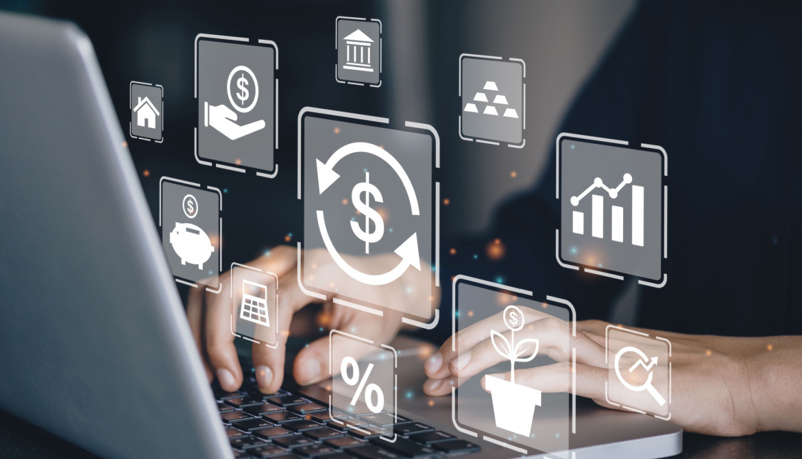 Businessman using a computer to manage investments