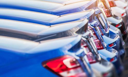 A row of colorful new cars