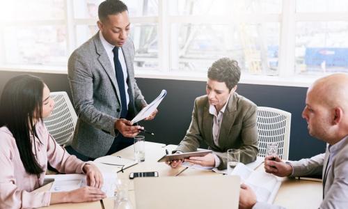 board members work together at a table