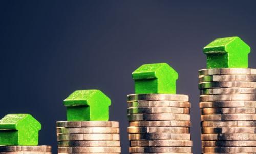 green houses on stacks of coins forming a graph that's increasing