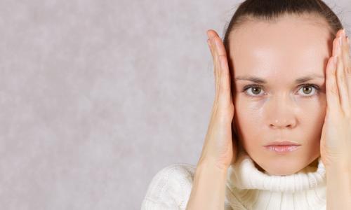 woman using hands as blinders