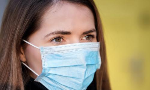 young woman wearing mask