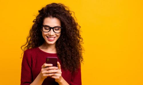 young woman engaged with her smartphone