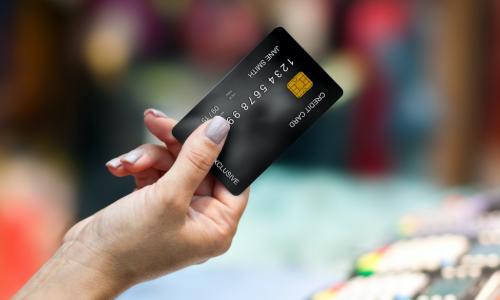 close up of woman hand holding credit card