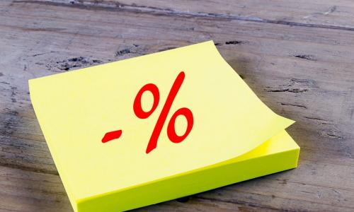 yellow sticky note with negative percentage sign