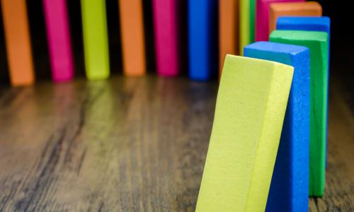 colorful dominos falling