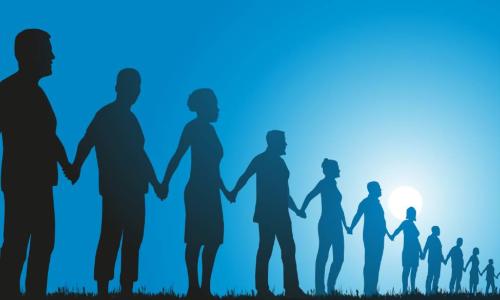 people lined up holding hands on blue sky