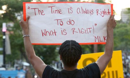 Martin Luther King Jr. quote on poster during protest